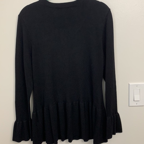 Black V neck Fever sweater with flaired sleeves and around hips. - Picture 6 of 8